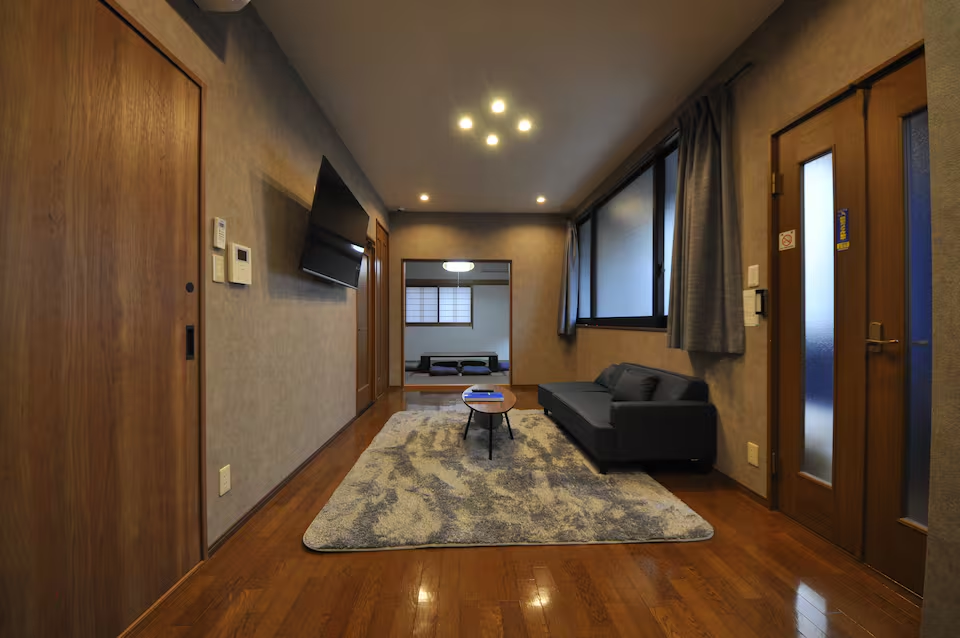The Sanctuary private residence with a warm interior lounge and showcase room in Kobe.